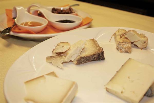 Cheese platter with honey and sauces, Piedmont