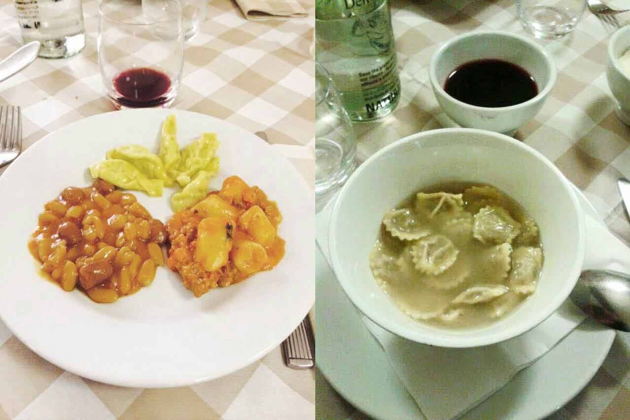 Piatti di fagioli, gnocchi al ragù e tortellini in brodo su tavola della trattoria