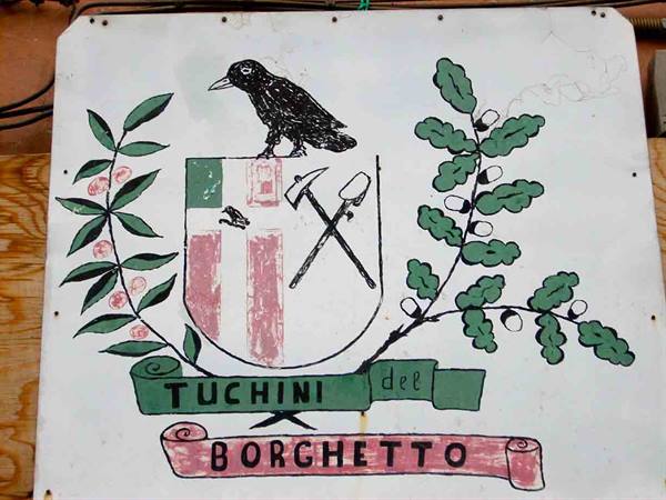 The plaque on the headquarters of the Tuchini orange throwers' team