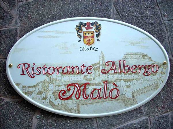 The sign of the Albergo Ristorante Malò