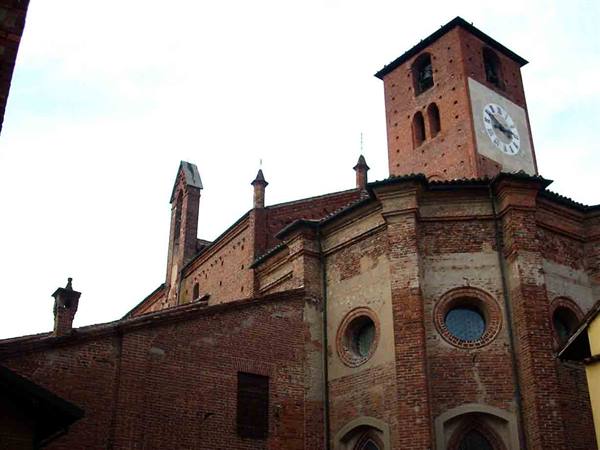 Brick church with bell tower and clock, diffused light