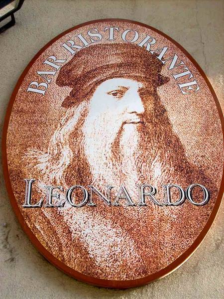 Oval sign of Bar Ristorante Leonardo featuring Leonardo da Vinci portrait