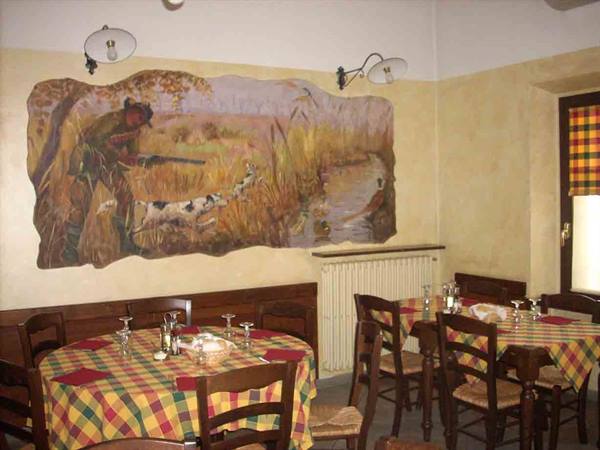 In the dining rooms of the Locanda della Pesa