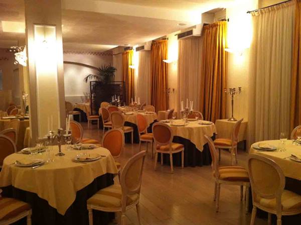 In the dining room of Ristorante Ad Convivium