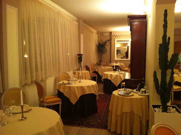 In the dining room of Ristorante Ad Convivium