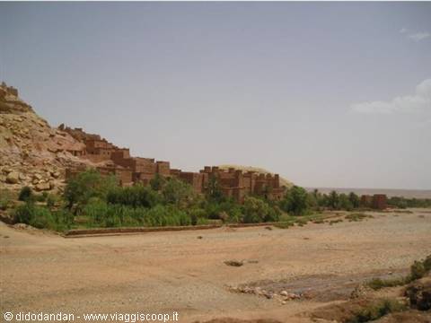The earthen ksar of Aït Benhaddou beneath a clear blue sky