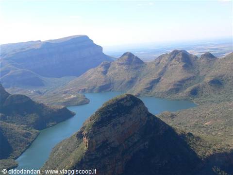 Lake surrounded by rocky peaks in Blyde River Canyon