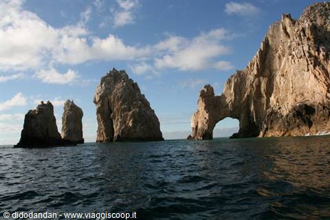 The Arch of Cabo San Lucas, rocky cliffs rising from blue ocean