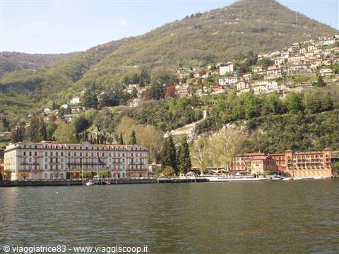 Lakeside belle époque hotels on Lake Como, green hill rising behind