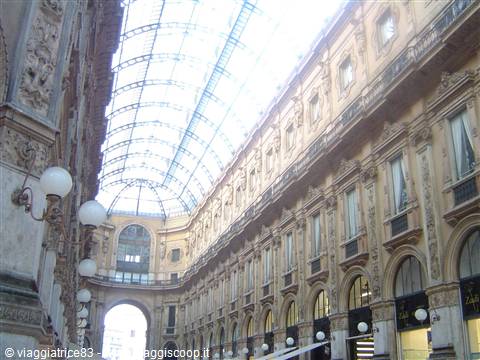 Galleria Vittorio Emanuele II in Milan, glass and iron vault above ornate 19th-century facades