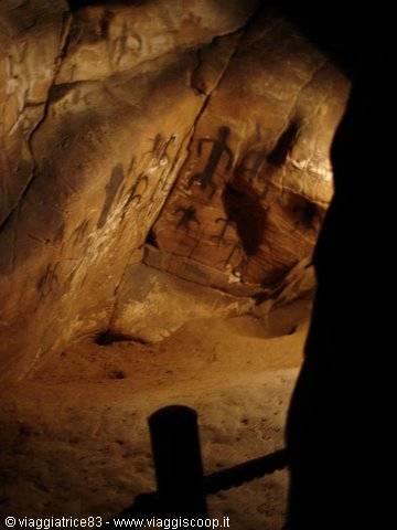 Rock paintings with human figures on the cave wall