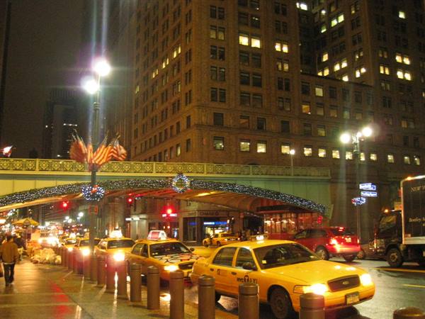 Yellow cabs under the decorated Grand Central viaduct, New York