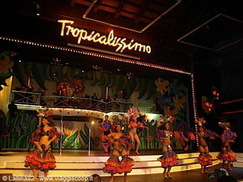 Rumba dancers in colorful ruffled skirts on the Tropicana cabaret stage