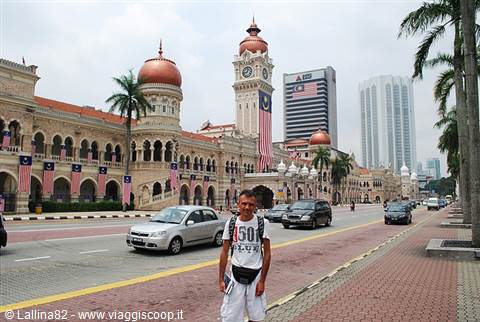 Tourist on the road in front of the Sultan Abdul Samad Building, Kuala Lumpur