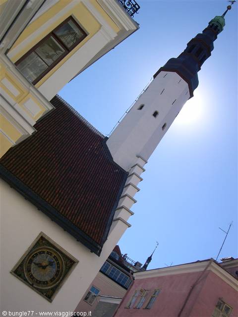 Holy Spirit Church tower and the old town hall clock in Tallinn
