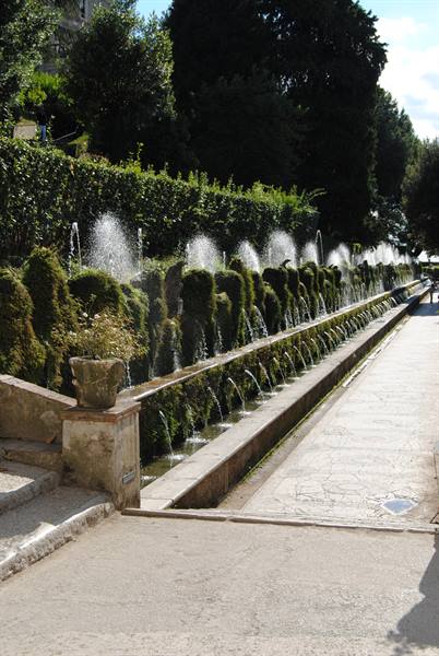 Hundred Fountains at Villa d'Este, water jets between mossy stone carvings