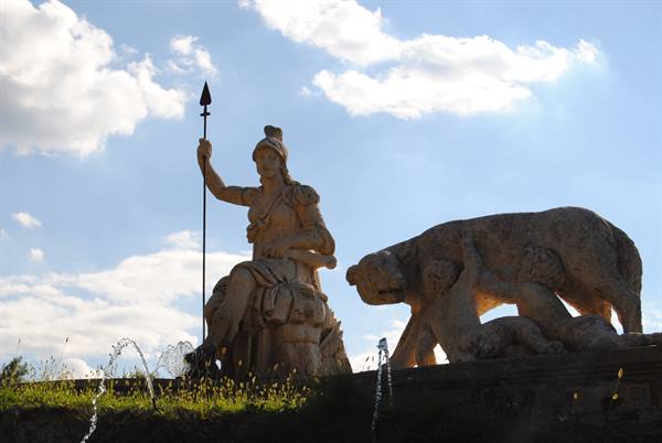 Statue of armed Roma with lance beside the she-wolf nursing Romulus and Remus