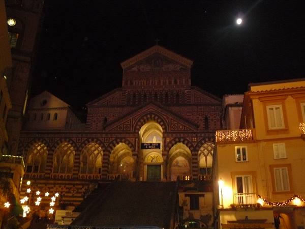 Amalfi Cathedral at night, illuminated mosaic facade under the moon