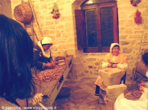women cleaning the almonds