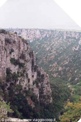 Limestone cliffs and Mediterranean scrub in Cava d'Ispica gorge