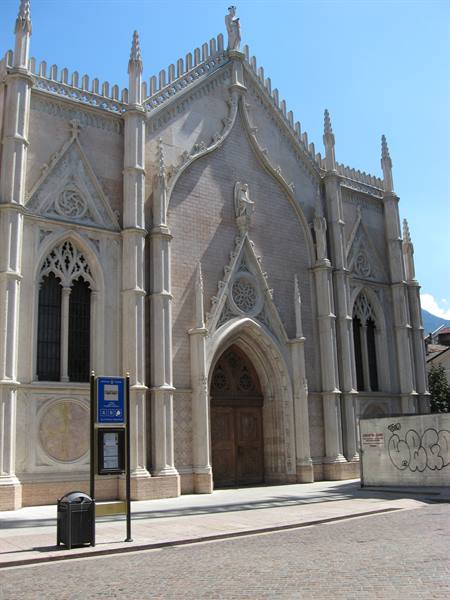 White stone neo-Gothic facade of the Basilica Minore dei Santi Filippo e Giacomo, Cortina d'Ampezzo