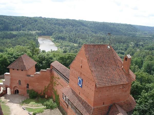 Turaida Castle: red brick towers above the Gauja river valley