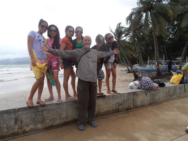me with a group of Filipino girls at Sabang beach, Palawan, Philippines
