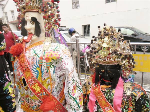 masks in front of a Chinese temple in Kuching, Sarawak,Malaysian Borneo