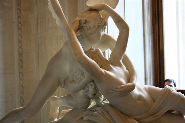 Canova's marble sculpture of Cupid reviving Psyche, Louvre, soft natural light
