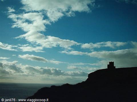 O'Brien's Tower silhouetted against the sky at the Cliffs of Moher