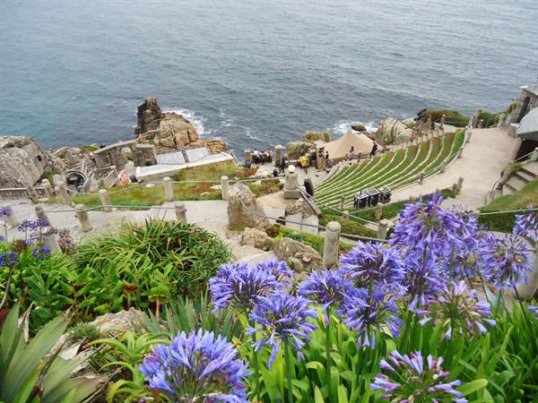 an image of the Minack Theatre, built sheer above the sea at Porthcurno