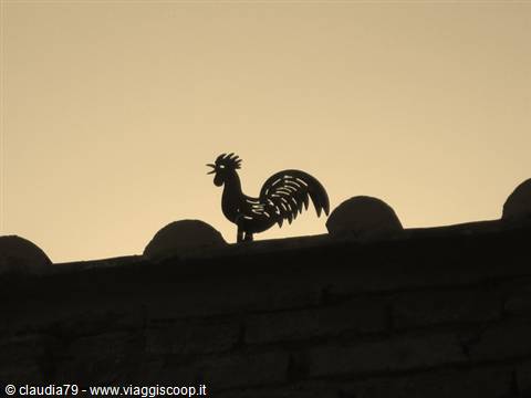 Castles and medieval villages in Tuscany. Weathervane rooster in Certaldo Alto (FI)