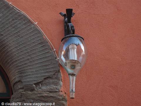 Tuscan food and wine. Theme lamp of the Enoteca Boccaccio in Certaldo Alto (FI)