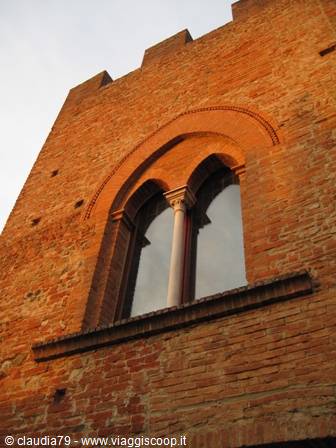 Castles and medieval villages in Tuscany, mullioned windows and battlemented towers in Certaldo Alto (FI)