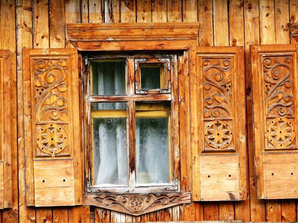 wood carvings of an old house