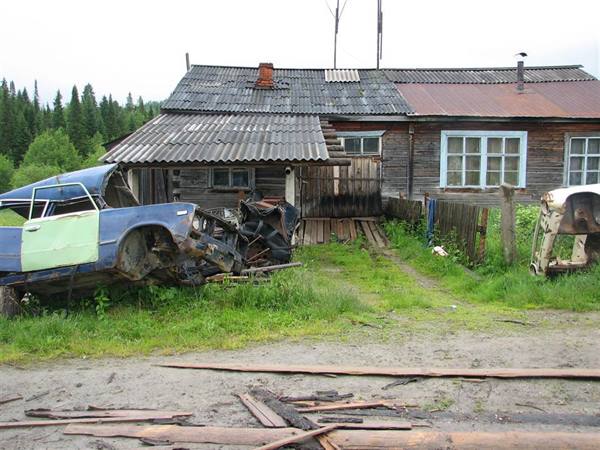 the dilapidated house of the village guide