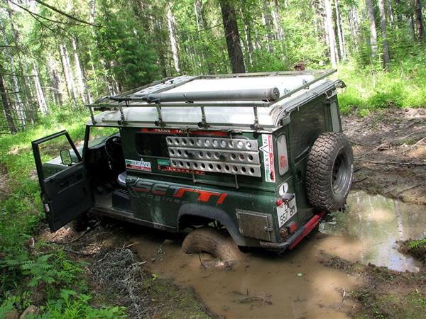 the group leader's Land Rover belly-flopped in a puddle