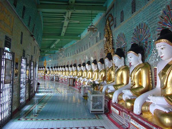 Curved corridor lined with seated golden Buddha statues at U Min Thonze temple
