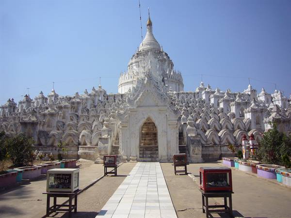 White Hsinbyume Pagoda in Mingun, wavy terraces under clear blue sky