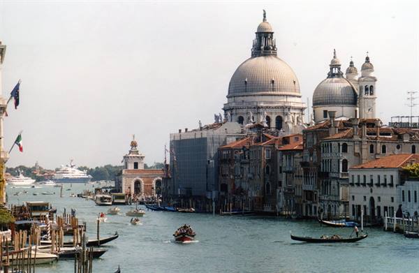 Boats and gondolas on the Grand Canal in front of Santa Maria della Salute, Venice