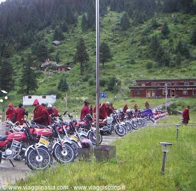 monks on motorbikes