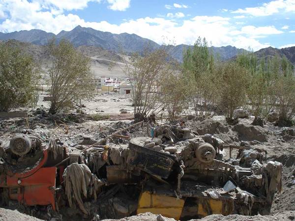 a truck buried in the rubble