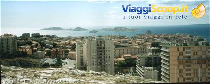 Marseille: 1970s apartment blocks over the city, Frioul islands on the sea