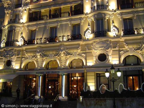 Illuminated Belle Epoque facade of the Hotel de Paris at night