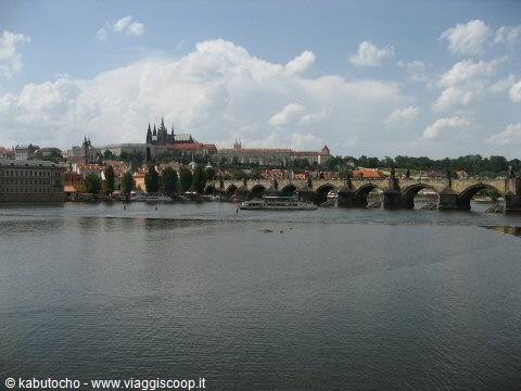 Charles Bridge across the Vltava river, with Prague Castle in the background