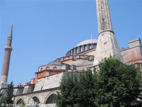 Minaret and dome of Hagia Sophia in Istanbul under blue sky
