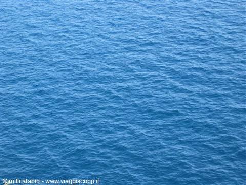blue open sea water rippled by the wind