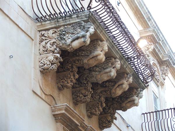 Noto, embroidered balconies of Palazzo Nicolaci.