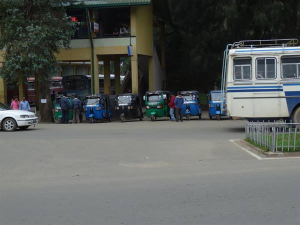 Tuk Tuk and private bus.