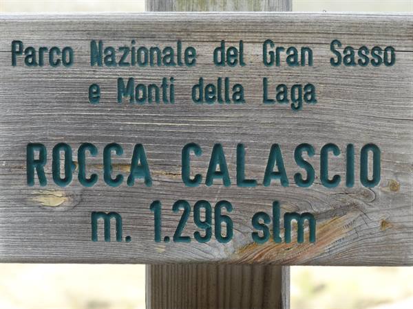 Wooden sign of Gran Sasso National Park at Rocca Calascio, 1296 meters